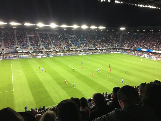 Playing soccer at a stadium