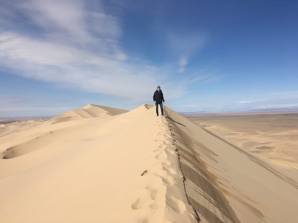 Standing atop a sand dune in Mongolia